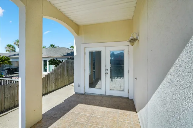 a view of a bathroom from a hallway