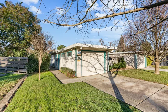 a view of a backyard with a slide