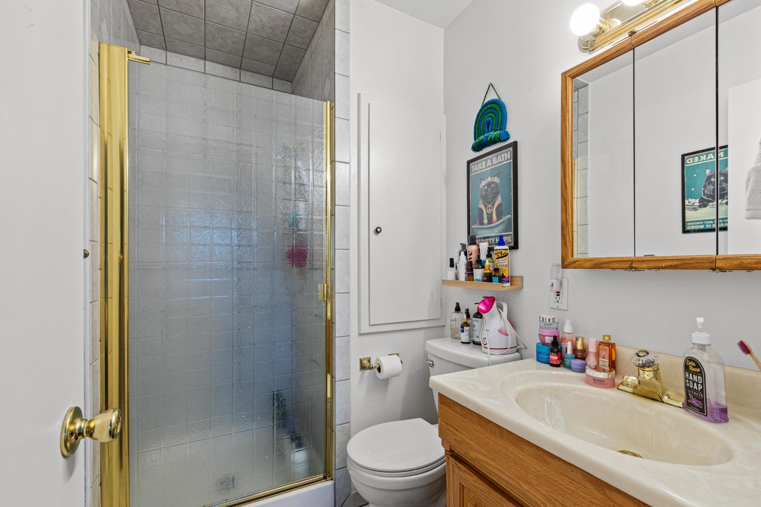 4329 Zephyr Way Sacramento, CA 95821 - Photo 24 of 44 a bathroom with a sink toilet and shower