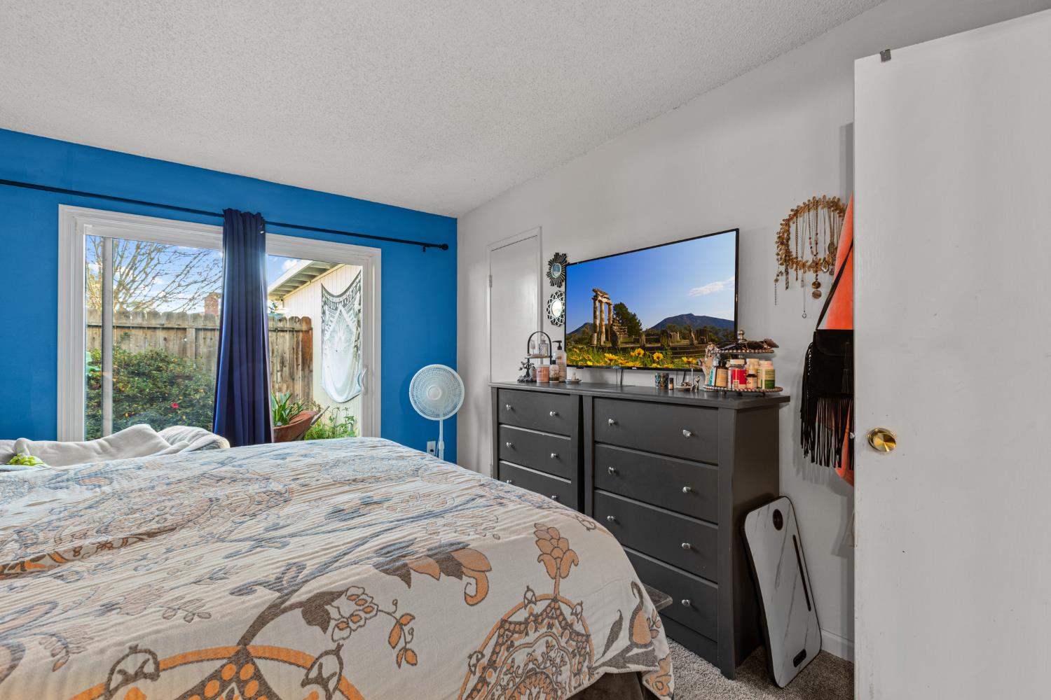 4329 Zephyr Way Sacramento, CA 95821 - Photo 25 of 44 a bedroom with a bed dresser and window