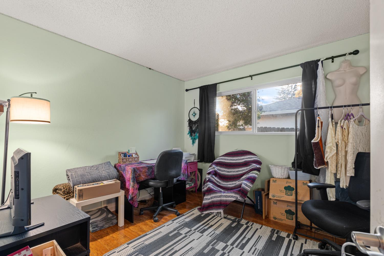 4329 Zephyr Way Sacramento, CA 95821 - Photo 28 of 44 a work room with furniture lamp and window