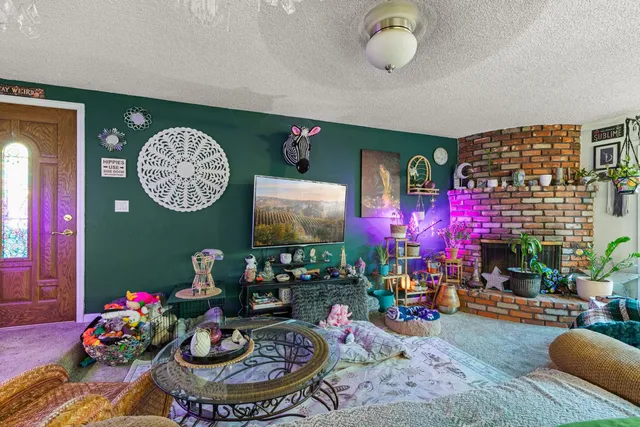 a room with furniture and a clock