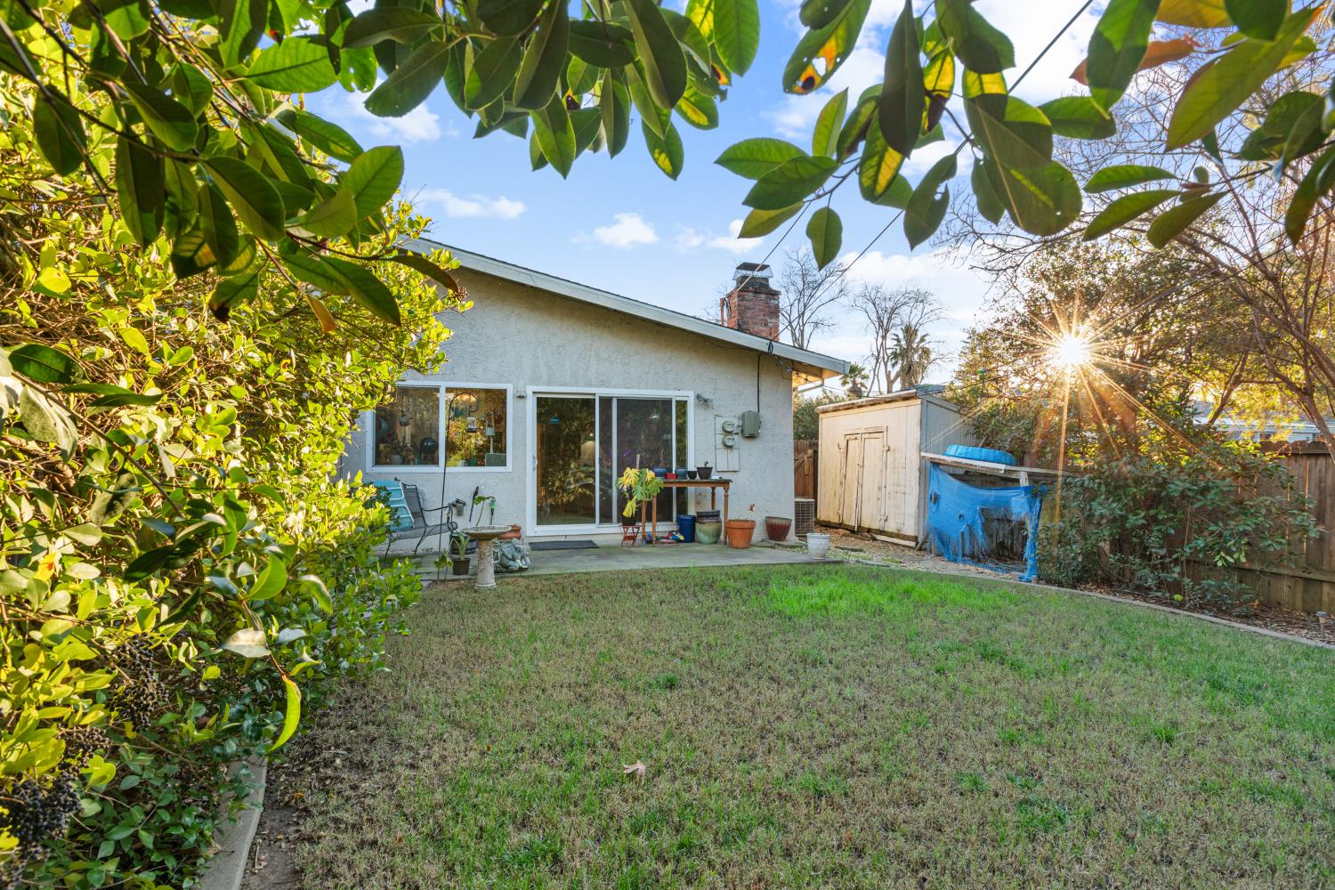 4329 Zephyr Way Sacramento, CA 95821 - Photo 38 of 44 a front view of a house with a garden