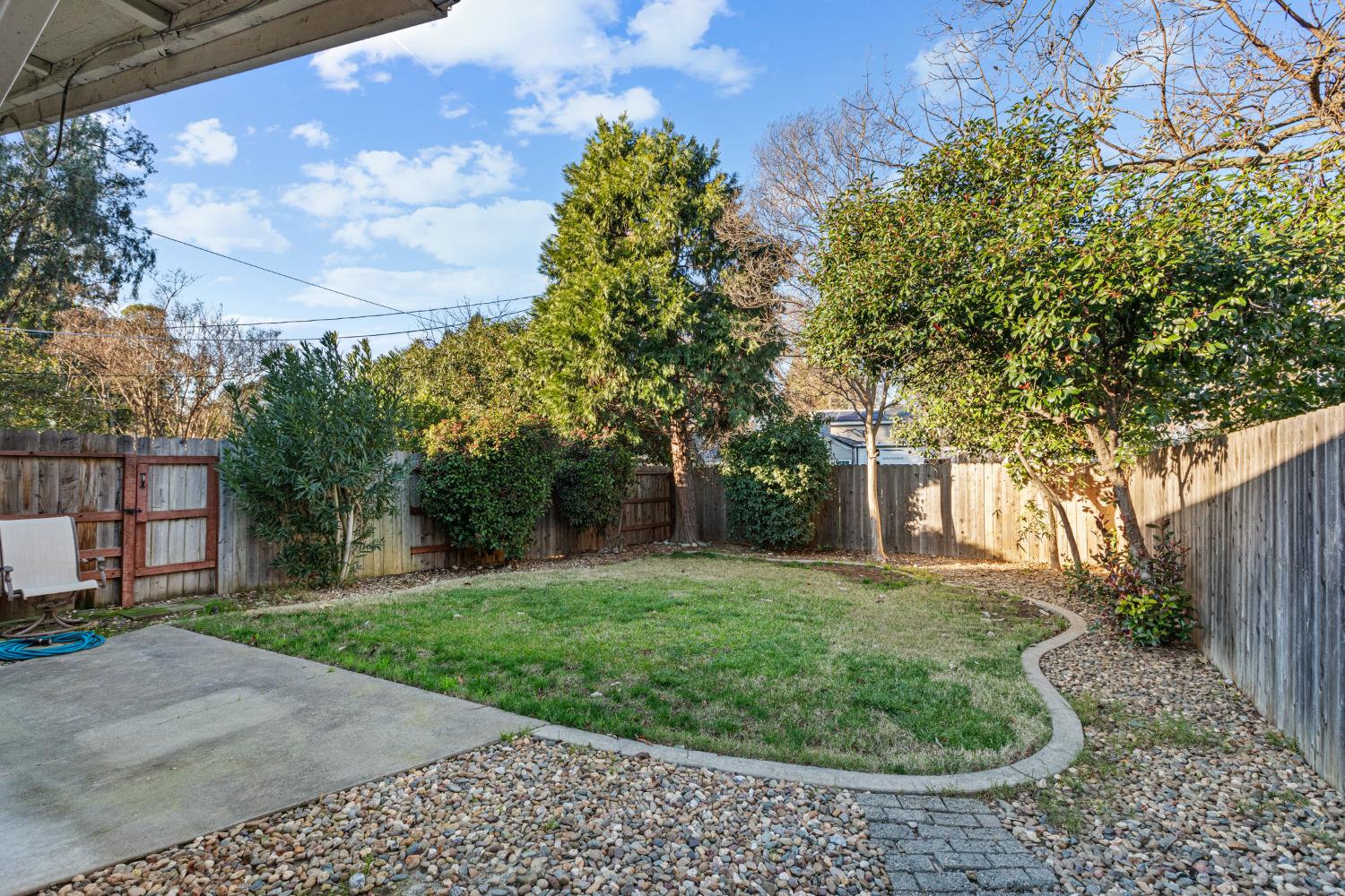 4329 Zephyr Way Sacramento, CA 95821 - Photo 4 of 44 a front view of a house with a yard