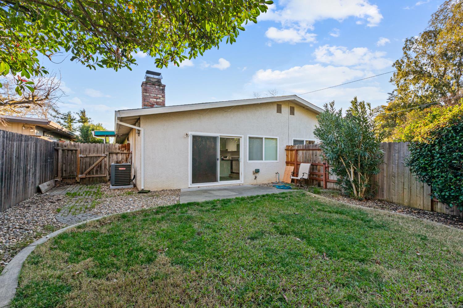 4329 Zephyr Way Sacramento, CA 95821 - Photo 5 of 44 a view of a house with a yard and sitting area
