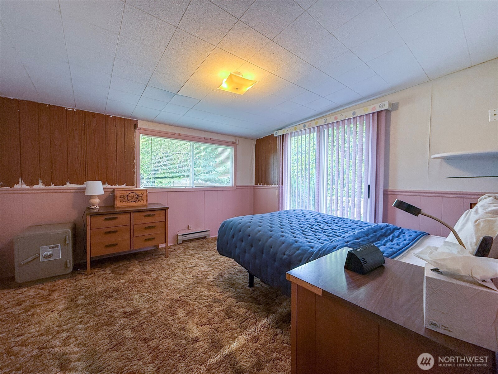 518 Bridge Street Twisp, WA 98856 - Photo 21 of 40 a bedroom with furniture and a window