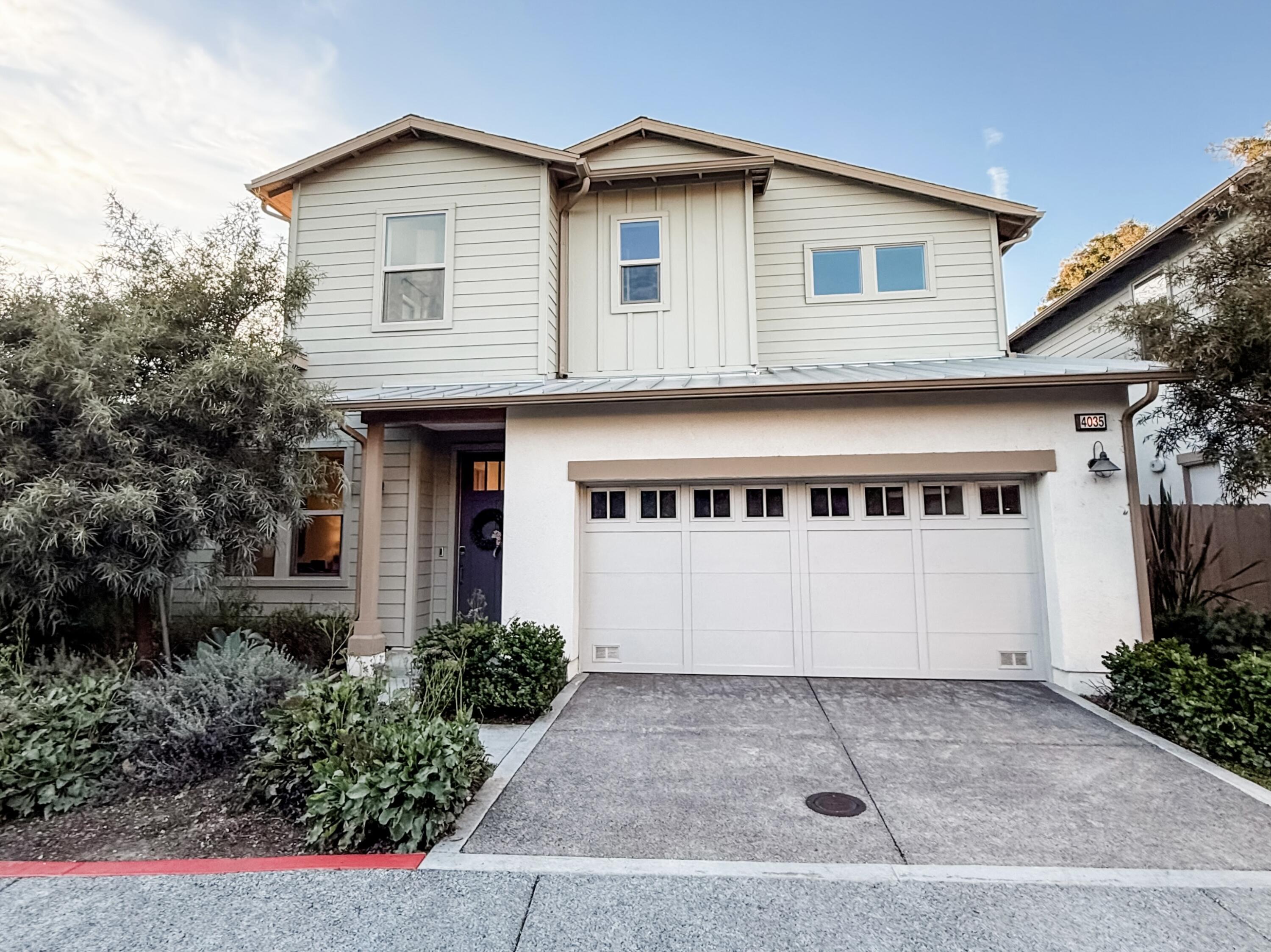 4035 Green Heron Springs Road Carpinteria, CA 93013 - Photo 1 of 13 a front view of a house with garage