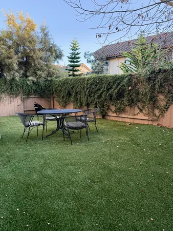 a view of a table and chairs in patio