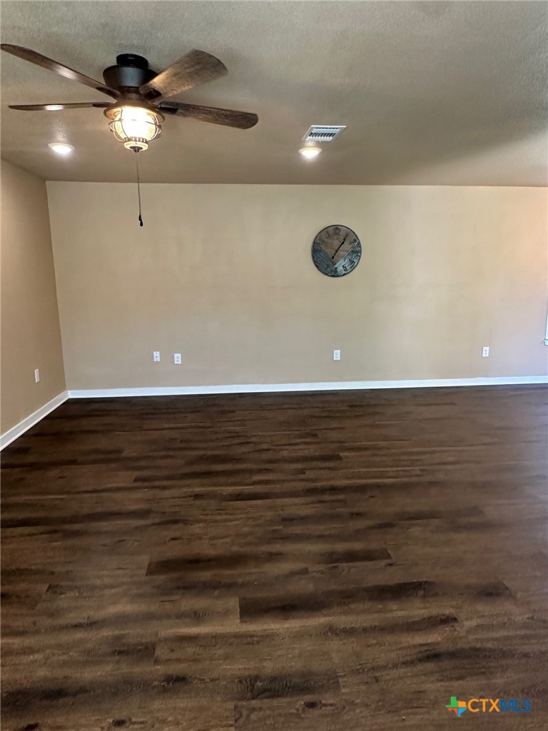 952 Fannin Loop Temple, TX 76501 - Photo 11 of 15 a view of an empty room with wooden floor