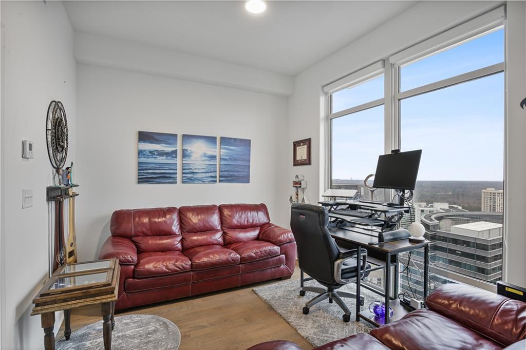 3445 Stratford Road Northeast, Unit 3703 Atlanta, GA 30326 - Photo 35 of 59 a workspace with furniture and a window