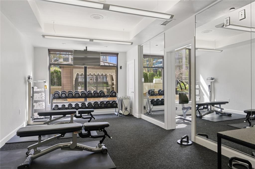 3445 Stratford Road Northeast, Unit 3703 Atlanta, GA 30326 - Photo 41 of 59 a view of a room with gym equipment
