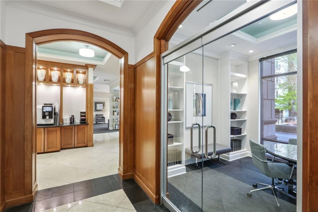 3445 Stratford Road Northeast, Unit 3703 Atlanta, GA 30326 - Photo 49 of 59 a view of a hallway with seating area