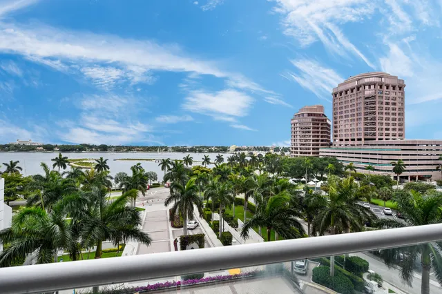 a view of a balcony with plants
