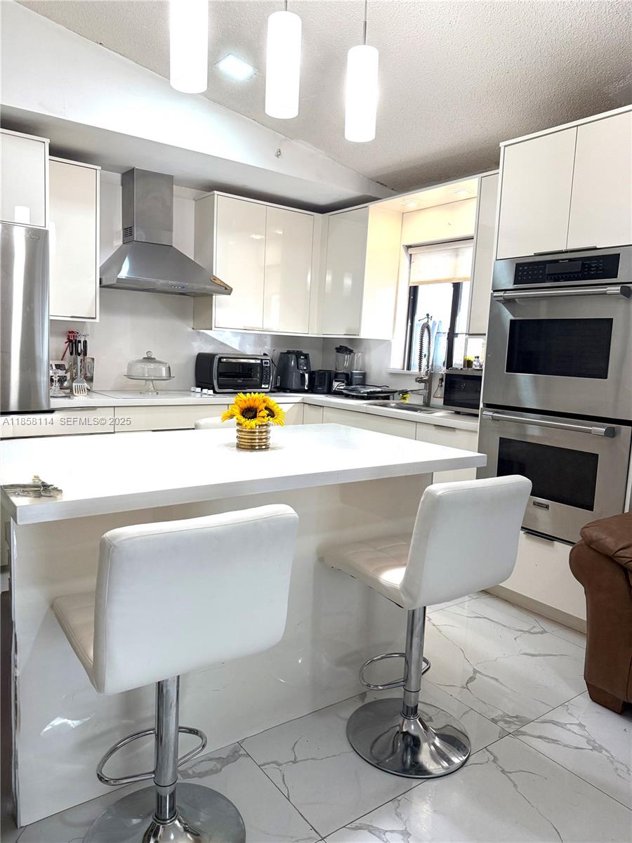 11266 Southwest 33rd Street Miami, FL 33165 - Photo 10 of 19 a living room with fireplace furniture and a flat screen tv