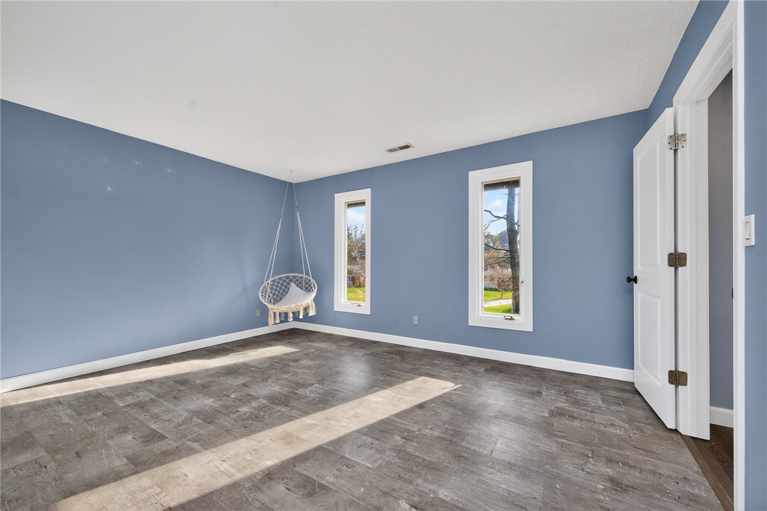 4747 Fawnwood Road Dayton, OH 45429 - Photo 47 of 58 This spacious room features ample natural light and durable flooring, perfect for versatile living.