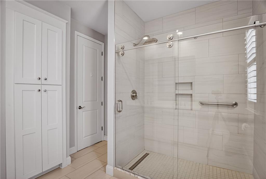 1508 Orion Road Bridgeville, PA 15017 - Photo 19 of 50 Master Bath Tiled Shower with a glass slider enclosure