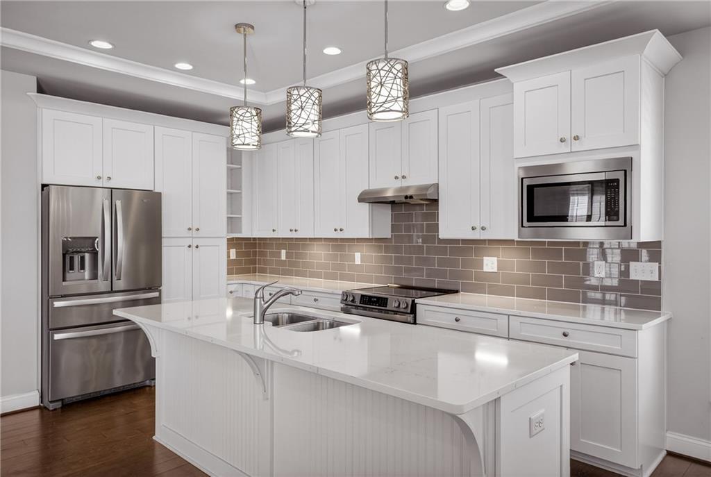 1508 Orion Road Bridgeville, PA 15017 - Photo 9 of 50 Kitchen 15x13 Includes all Stainless Steel Appliances and pendant lighting