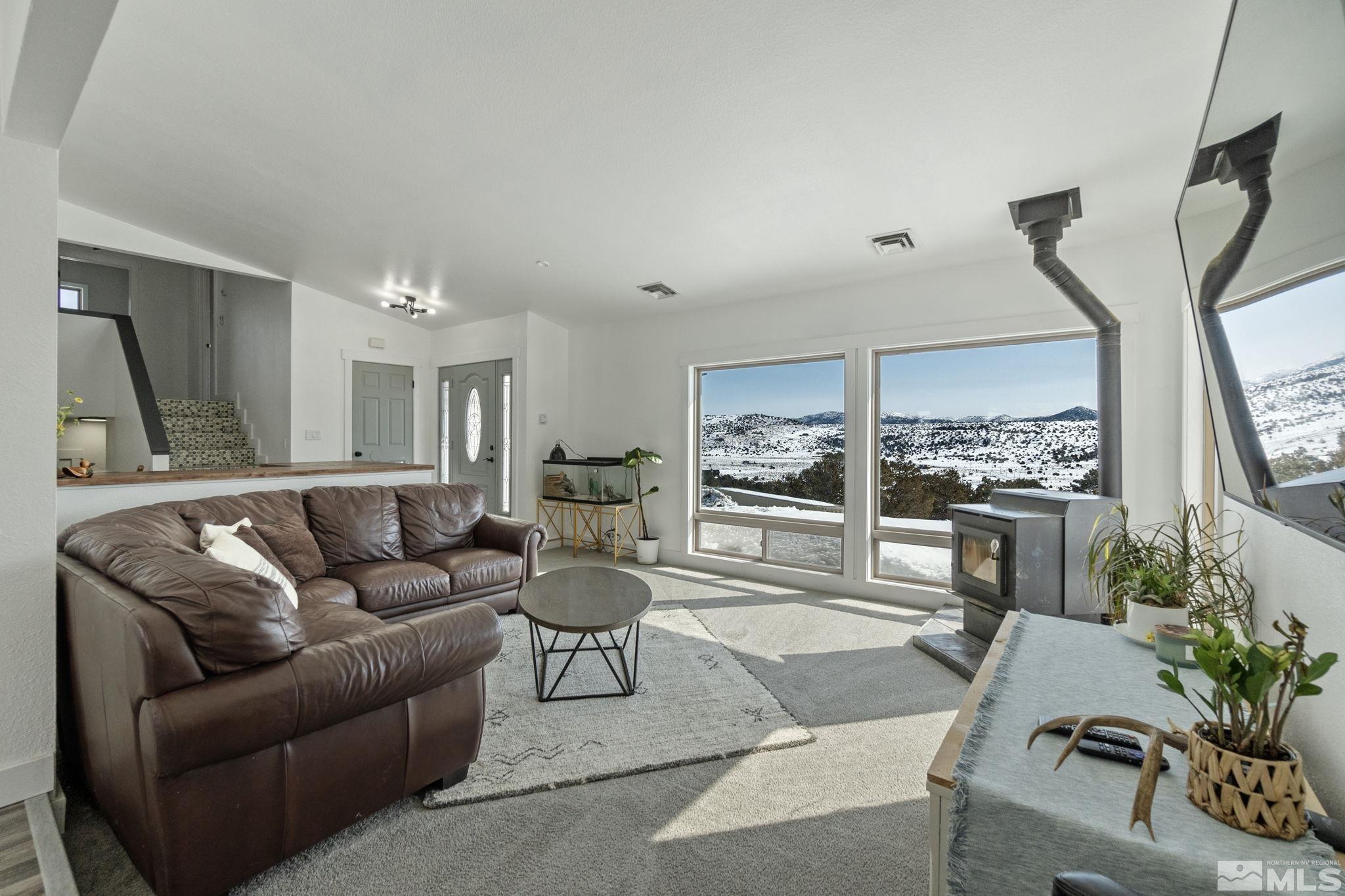 2440 Adobe Reno, NV 89521 - Photo 13 of 40 a living room with furniture and a large window
