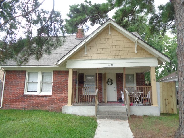 a front view of a house with a porch