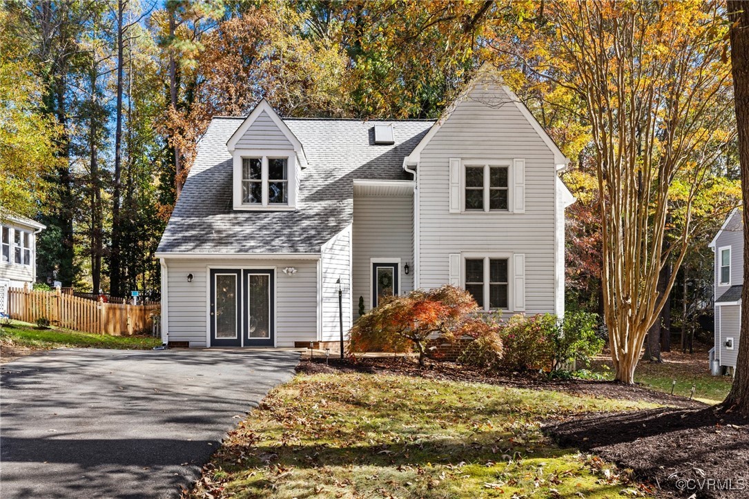 6209 Heather Glen Road Midlothian, VA 23112 - Photo 1 of 13 a front view of a house with garden