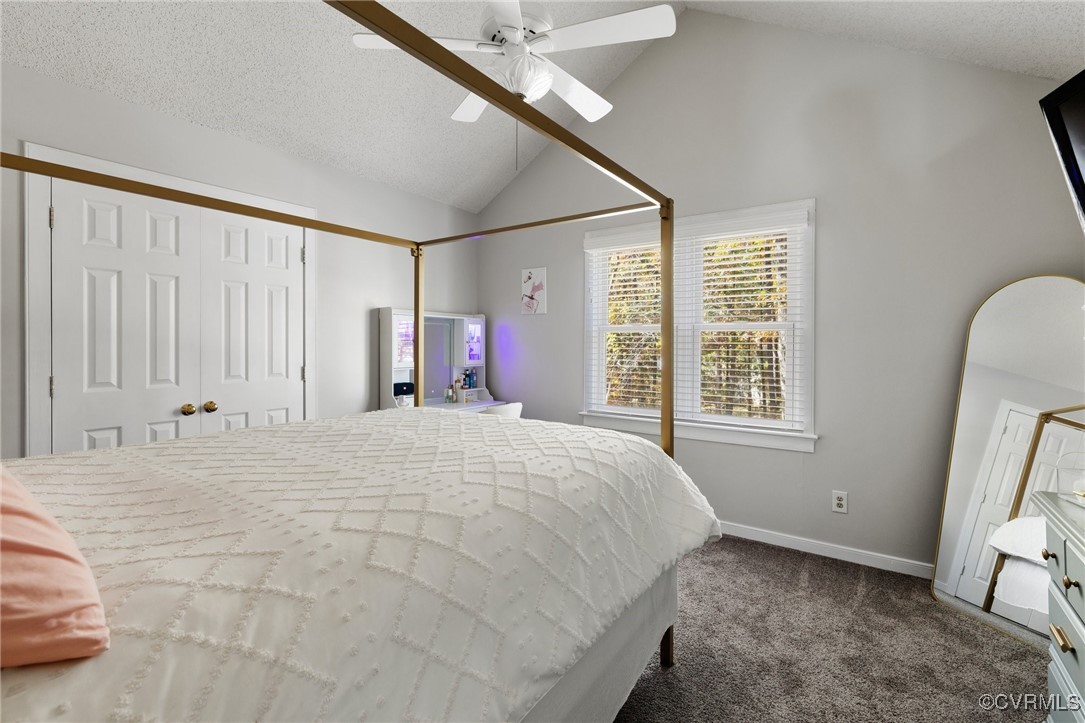 6209 Heather Glen Road Midlothian, VA 23112 - Photo 10 of 13 a large bed sitting in a bedroom next to a window
