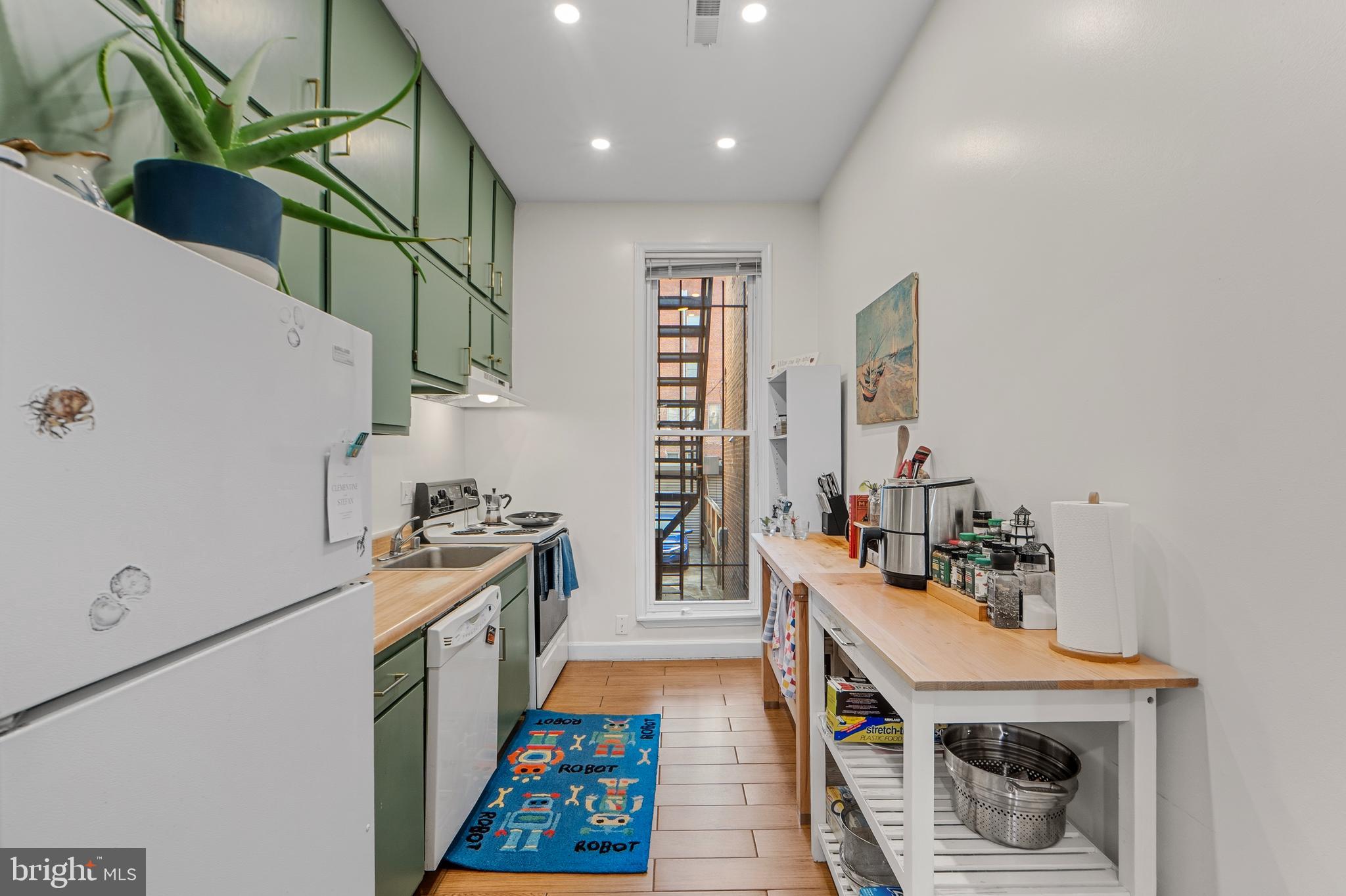 1927 15th Street Northwest Washington, DC 20009 - Photo 30 of 59 a utility room with sink dryer and washer