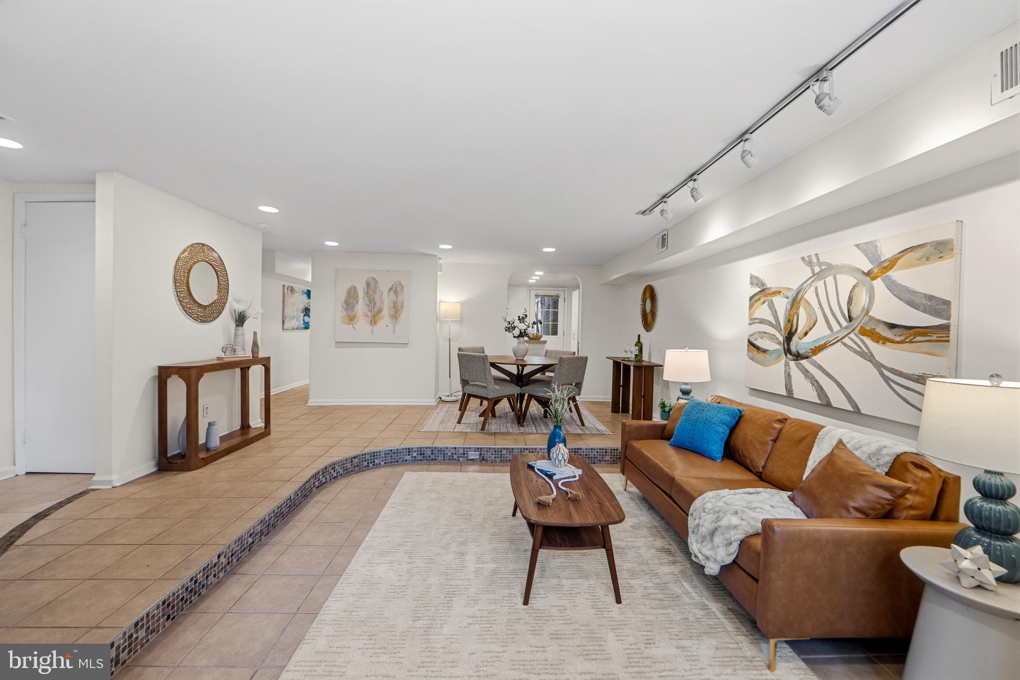1927 15th Street Northwest Washington, DC 20009 - Photo 40 of 59 a living room with furniture and kitchen view