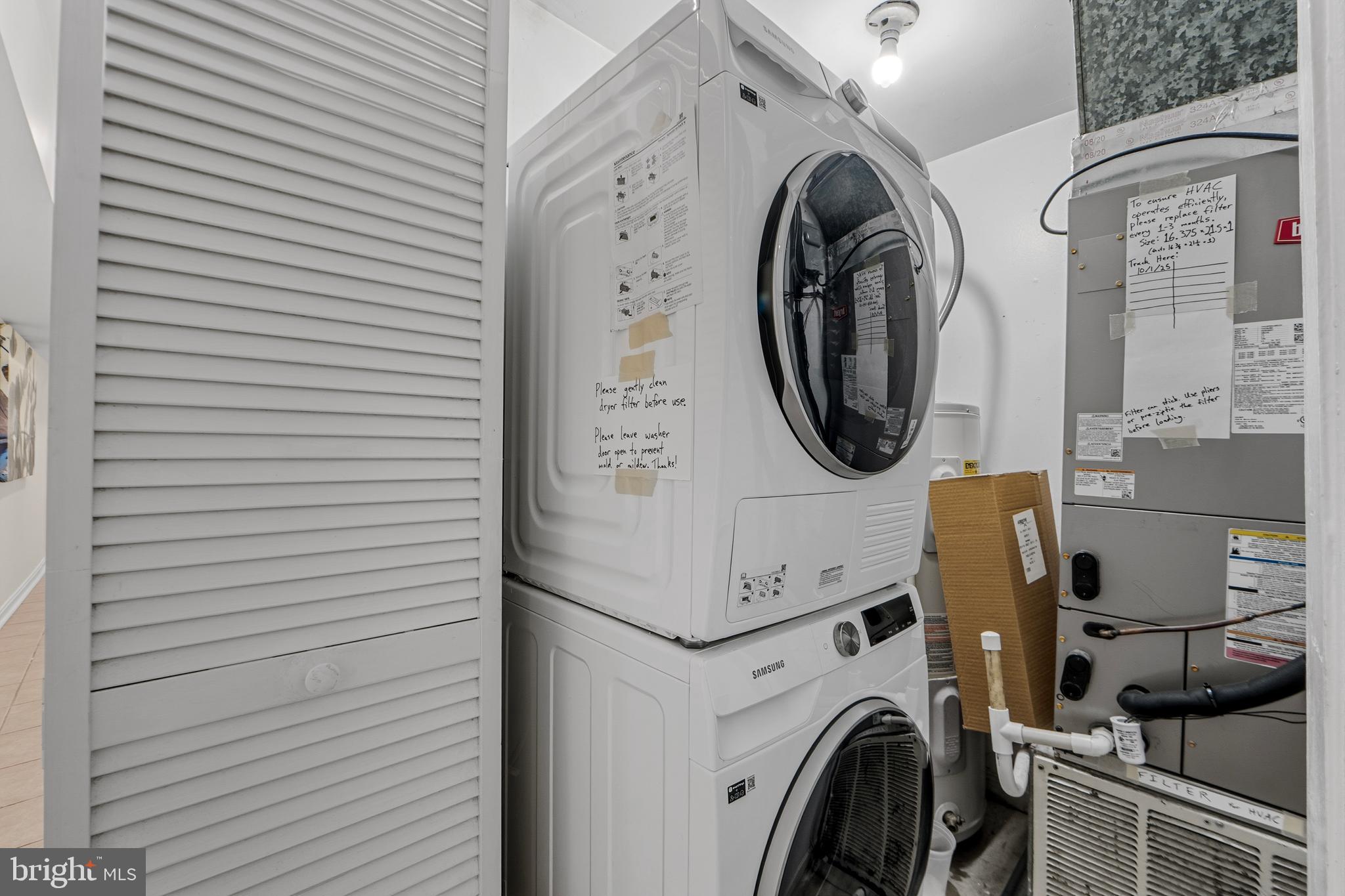 1927 15th Street Northwest Washington, DC 20009 - Photo 51 of 59 a utility room with dryer and washer