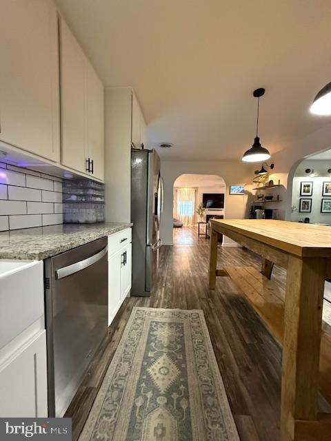 37181 Asher Road Mechanicsville, MD 20659 - Photo 17 of 50 a kitchen with stainless steel appliances granite countertop a stove a sink and a refrigerator