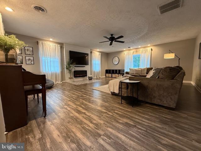 37181 Asher Road Mechanicsville, MD 20659 - Photo 19 of 50 a living room with furniture and a flat screen tv