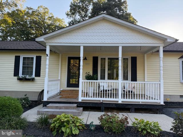 37181 Asher Road Mechanicsville, MD 20659 - Photo 2 of 50 front view of a house with a deck