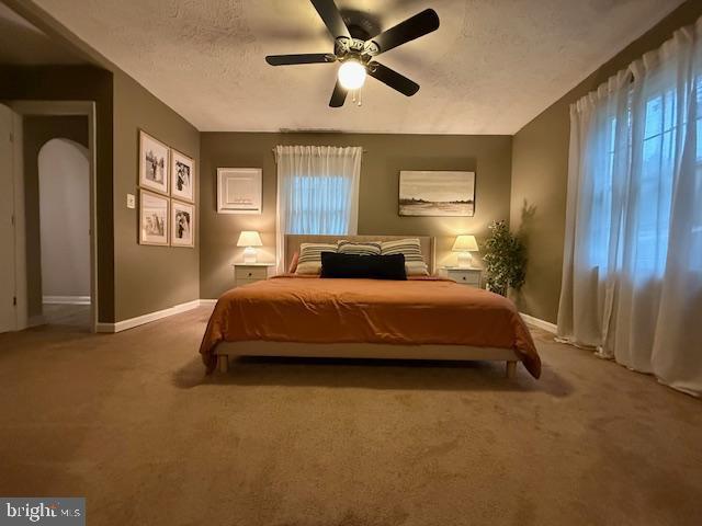 37181 Asher Road Mechanicsville, MD 20659 - Photo 30 of 50 a bedroom with a bed and dresser with wooden floor