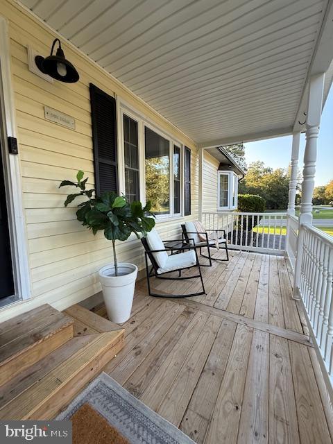 37181 Asher Road Mechanicsville, MD 20659 - Photo 3 of 50 a view of a patio with couches and potted plants