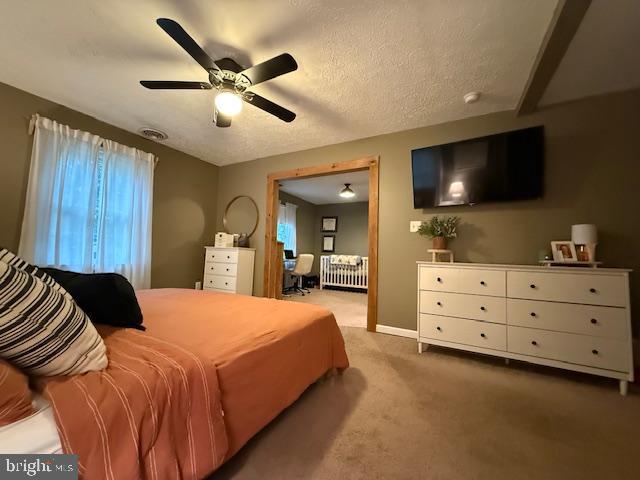 37181 Asher Road Mechanicsville, MD 20659 - Photo 31 of 50 a bedroom with a bed and a flat screen tv
