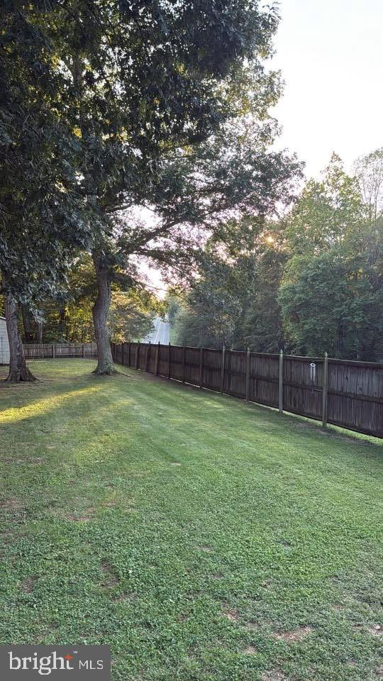 37181 Asher Road Mechanicsville, MD 20659 - Photo 49 of 50 a view of a backyard with a trees