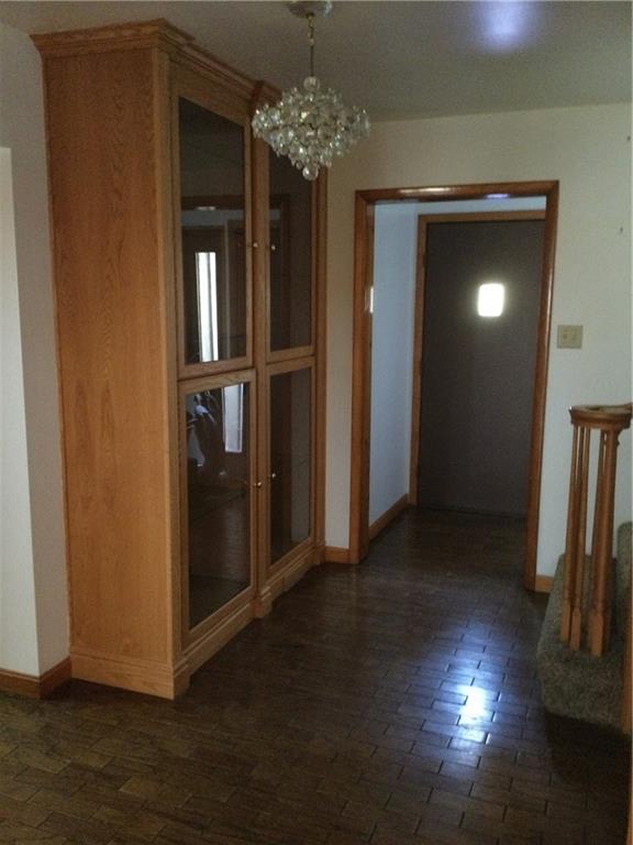 63 Ankrom Road Washington, PA 15301 - Photo 4 of 25 a view of a hallway with wooden floor and stairs