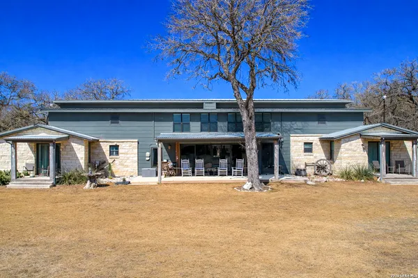 a view of a backyard of the house