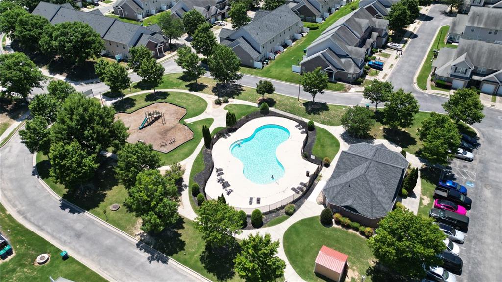 2555 Flat Shoals Road, Unit 2008 Atlanta, GA 30349 - Photo 29 of 33 an aerial view of residential house with outdoor space and swimming pool