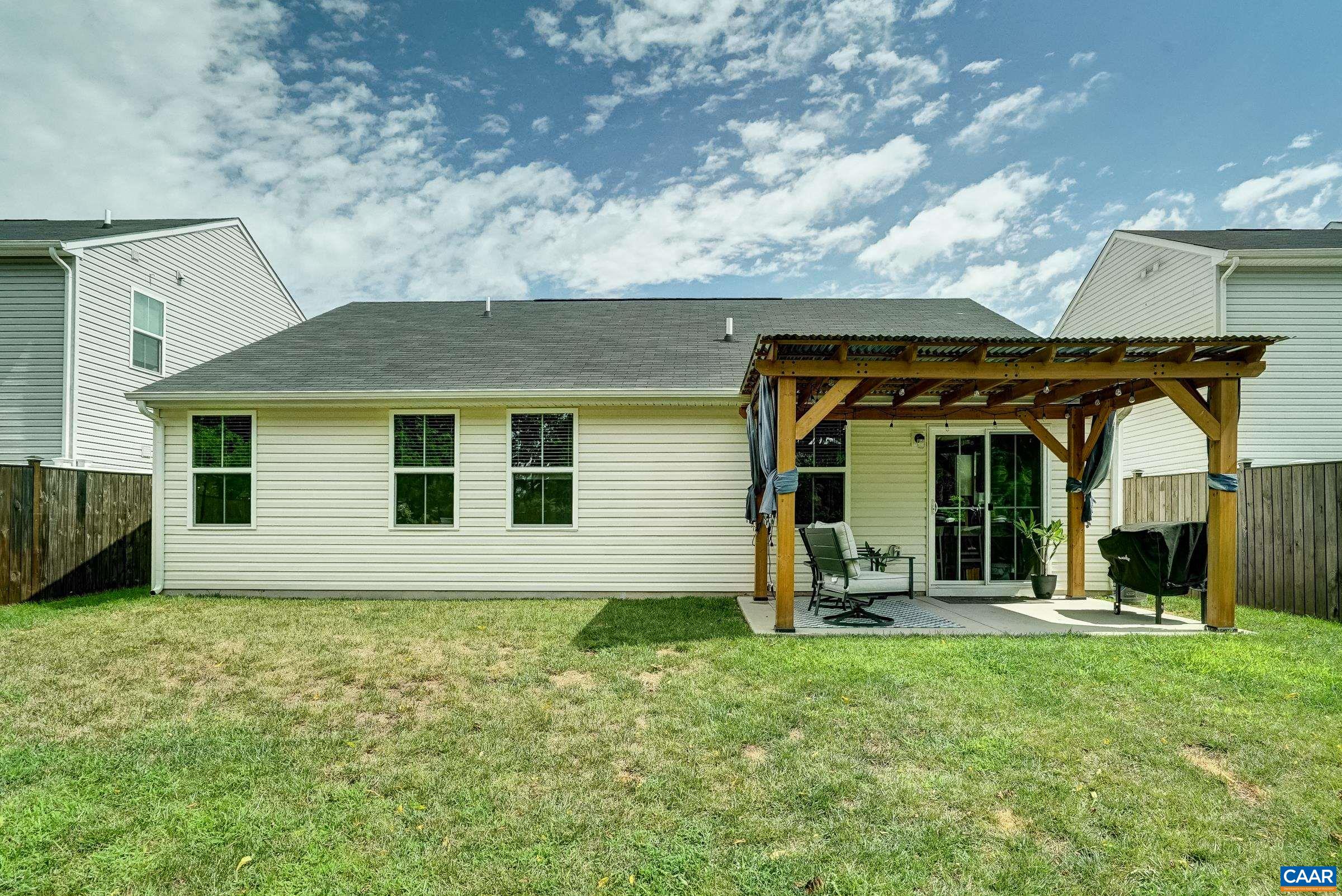 116 White Birch Road Waynesboro, VA 22980 - Photo 2 of 39 Flat back yard features privacy fence and covered patio with roofed pergola