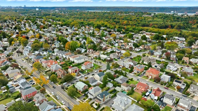 a aerial view of a house with garden space and sitting area