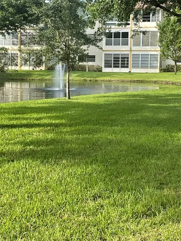 a house view with a lake view