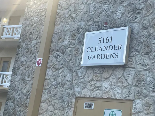 a sign board with parking