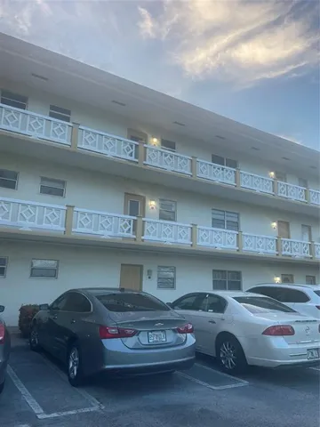 a car parked in front of a building