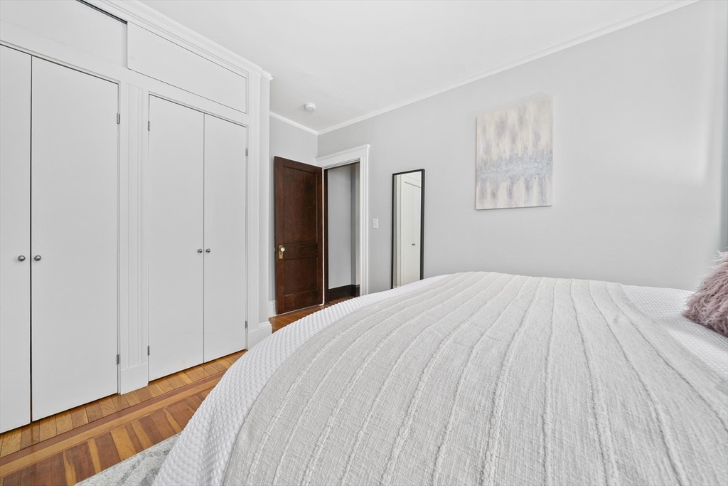 75 Parkton Road, Unit 3 Boston, MA 02130 - Photo 14 of 40 a bedroom with a bed and a closet
