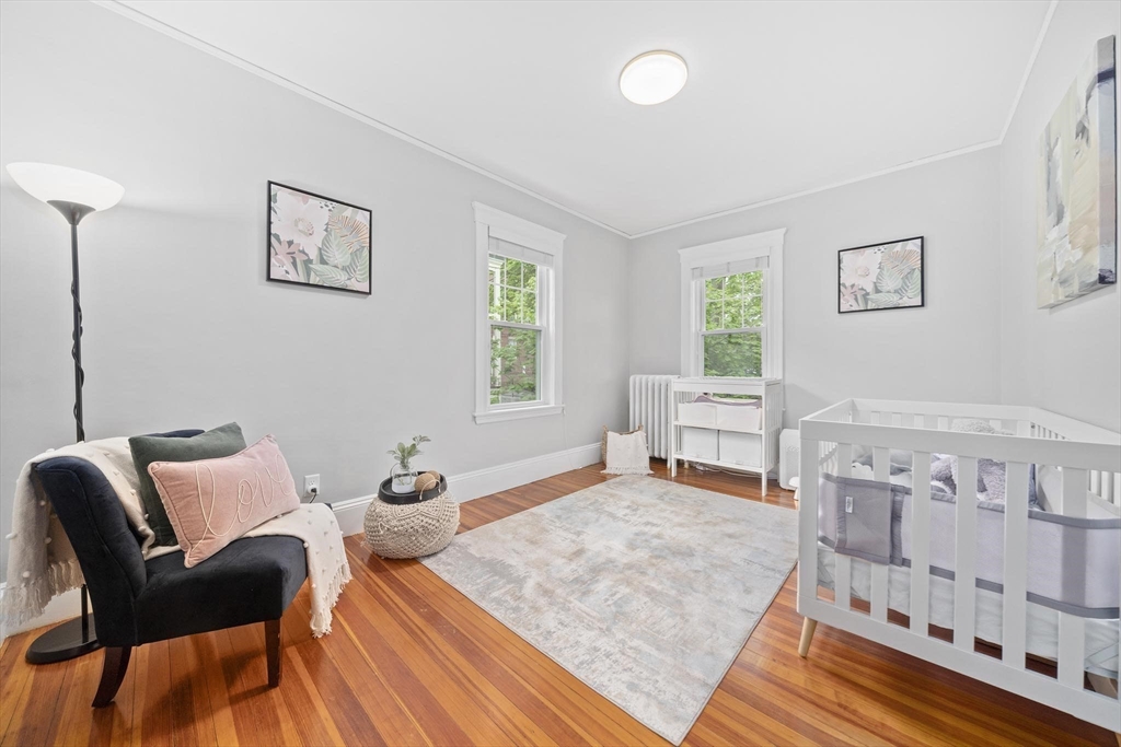 75 Parkton Road, Unit 3 Boston, MA 02130 - Photo 16 of 40 a living room with furniture and a rug