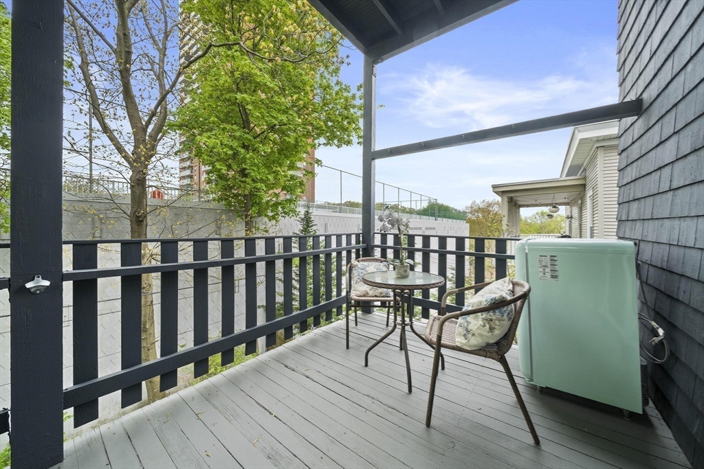 75 Parkton Road, Unit 3 Boston, MA 02130 - Photo 18 of 40 a view of a chairs on the deck