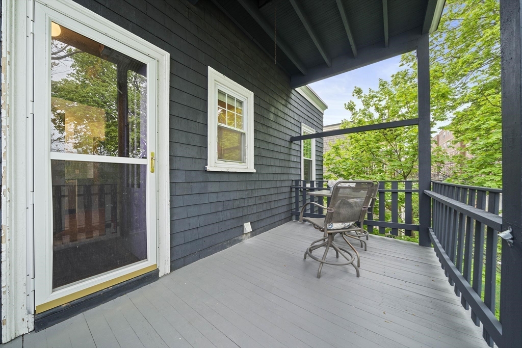 75 Parkton Road, Unit 3 Boston, MA 02130 - Photo 19 of 40 a view of balcony with chairs and wooden floor