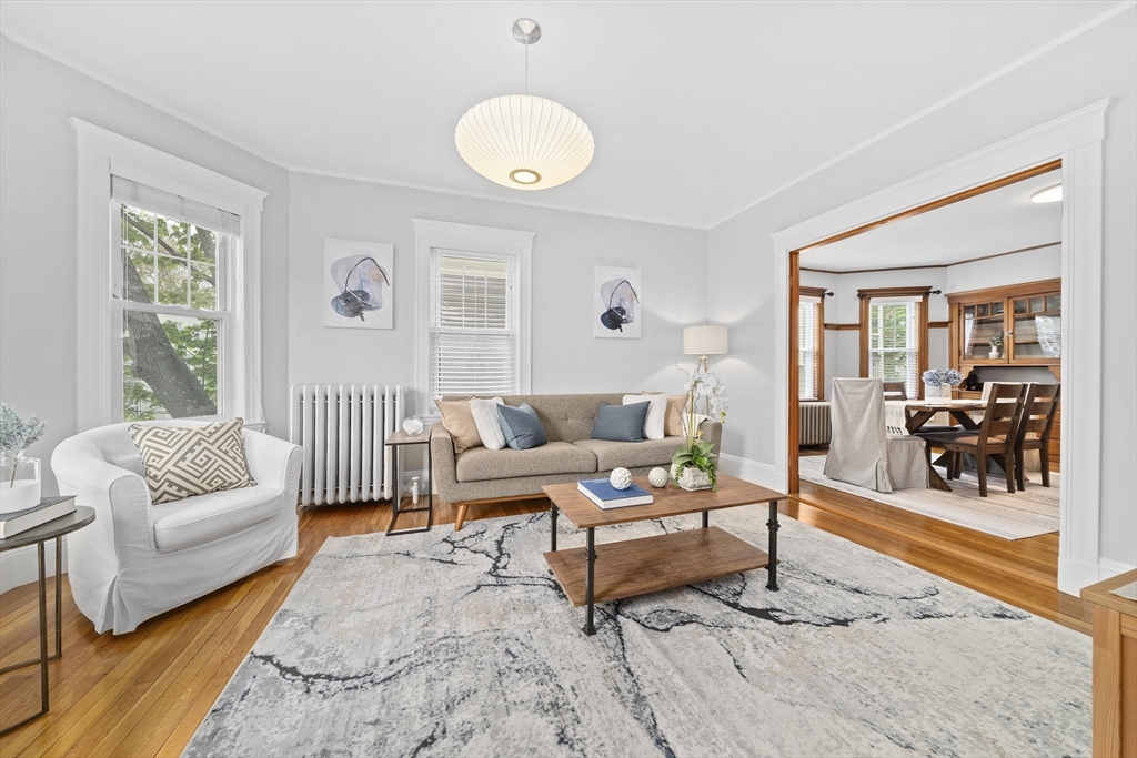 75 Parkton Road, Unit 3 Boston, MA 02130 - Photo 2 of 40 a living room with furniture and a large window
