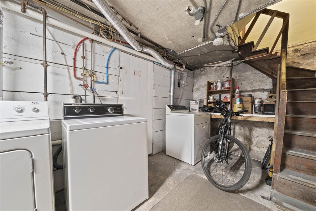 75 Parkton Road, Unit 3 Boston, MA 02130 - Photo 24 of 40 a storage and utility room with washer and dryer