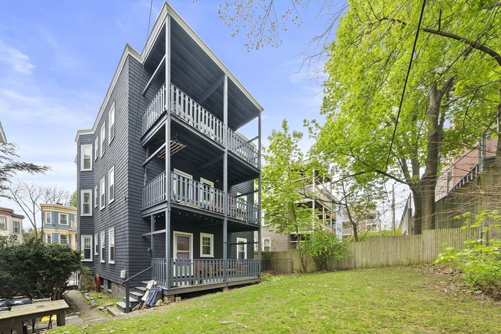 75 Parkton Road, Unit 3 Boston, MA 02130 - Photo 27 of 40 a front view of a house with garden